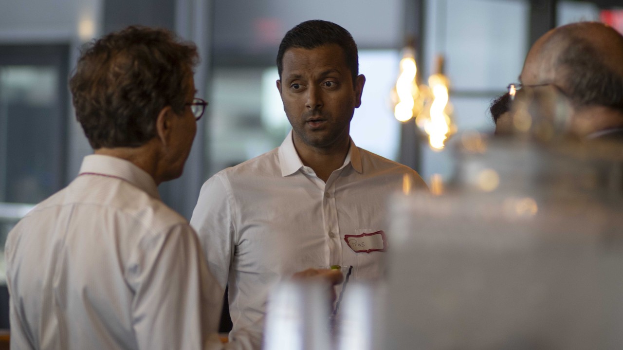 man talking to another person