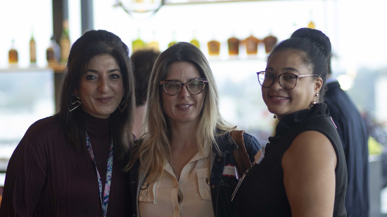 three women smiling