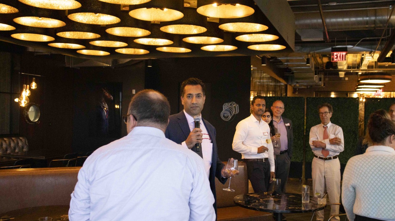 man talking to a crowd